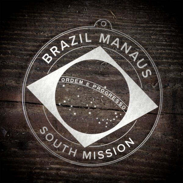 LDS Brazil Manaus South Mission Christmas Ornament laying on a Wooden Background