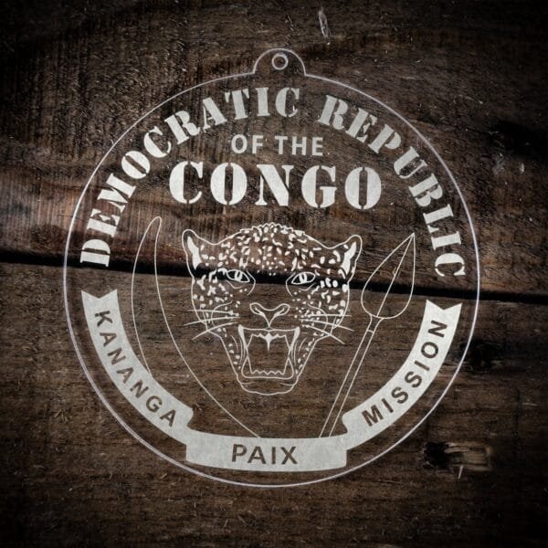 LDS Democratic Republic of the Congo Kananga Mission Christmas Ornament laying on a Wooden Background