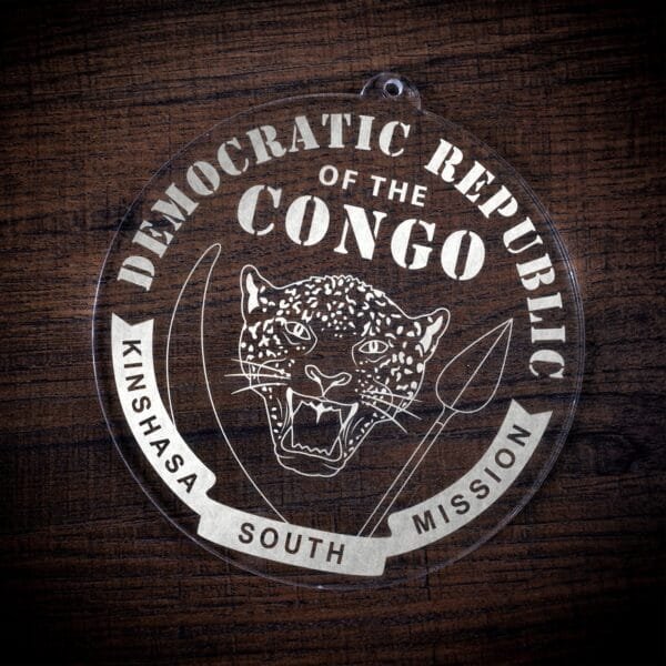 LDS Democratic Republic of the Congo Kinshasa South Mission Christmas Ornament laying on a Wooden Background