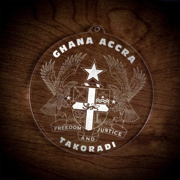 LDS Ghana Takoradi Mission Christmas Ornament laying on a Wooden Background