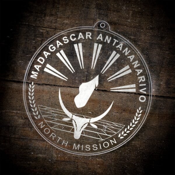 LDS Madagascar Antananarivo North Mission Christmas Ornament laying on a Wooden Background