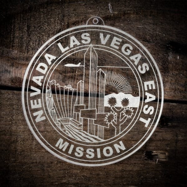 LDS Nevada Las Vegas East Mission Christmas Ornament laying on a Wooden Background
