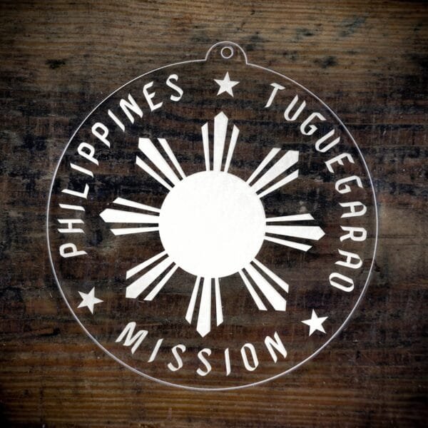 LDS Philippines Tuguegarao Mission Christmas Ornament laying on a Wooden Background