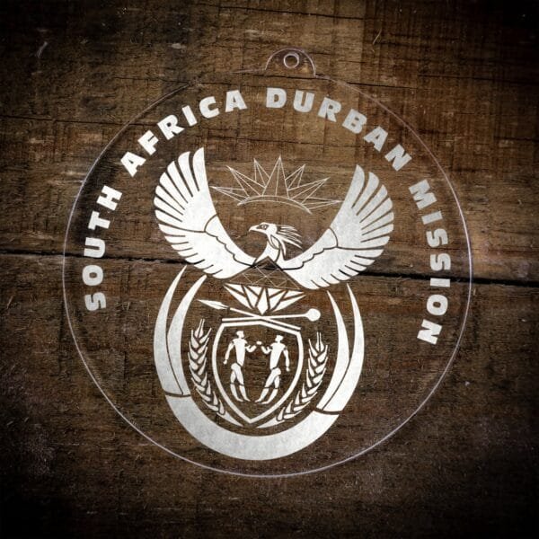 LDS South Africa Pretoria Mission Christmas Ornament laying on a Wooden Background