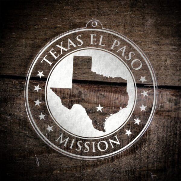 LDS Texas El Paso Mission Christmas Ornament laying on a Wooden Background