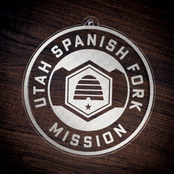 LDS Utah Spanish Fork Mission Christmas Ornament laying on a Wooden Background