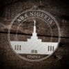LDS Aba Nigeria Temple Christmas Ornament laying on a Wooden Background