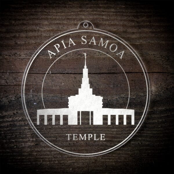 LDS Apia Samoa Temple Christmas Ornament laying on a Wooden Background