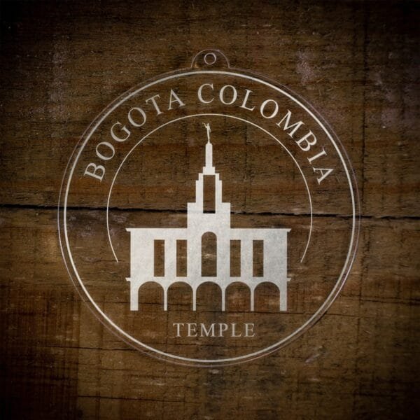LDS Bogota Colombia Temple Christmas Ornament laying on a Wooden Background