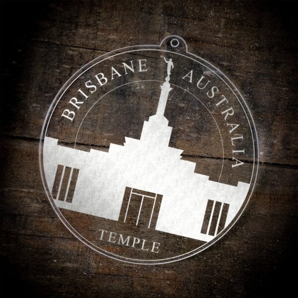 LDS Brisbane Australia Temple Christmas Ornament laying on a Wooden Background