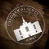LDS Calgary Alberta Temple Christmas Ornament laying on a Wooden Background