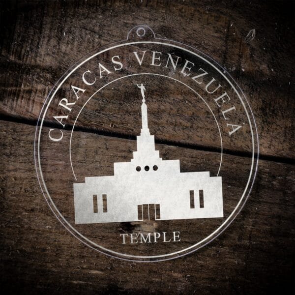 LDS Caracas Venezuela Temple Christmas Ornament laying on a Wooden Background