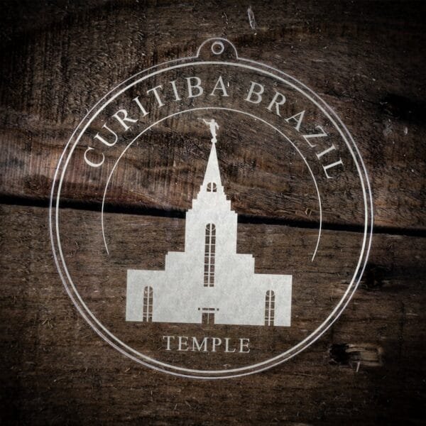 LDS Curitiba Brazil Temple Christmas Ornament laying on a Wooden Background