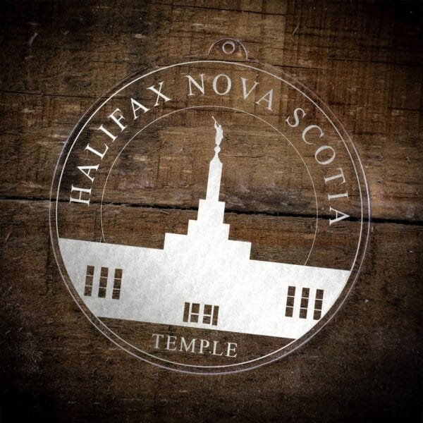 LDS Halifax Nova Scotia Temple Christmas Ornament laying on a Wooden Background
