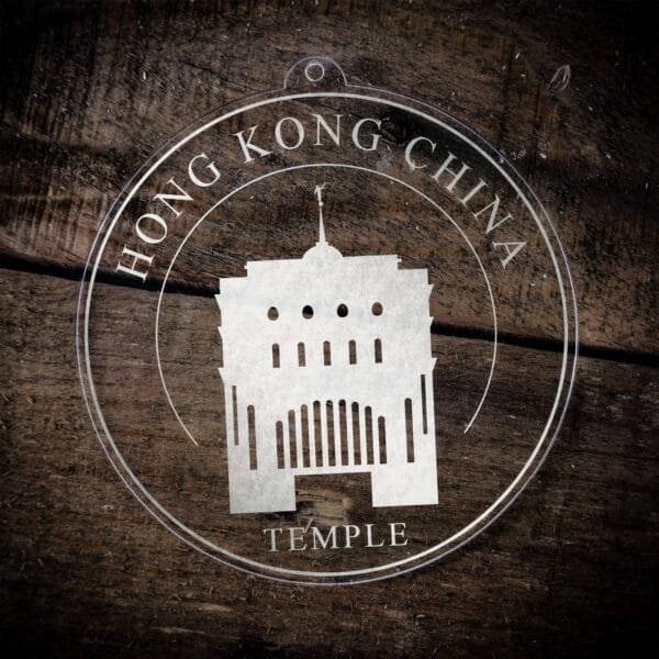 LDS Hong Kong China Temple Christmas Ornament laying on a Wooden Background