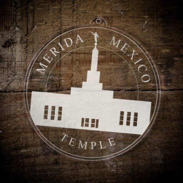 LDS Merida Mexico Temple Christmas Ornament laying on a Wooden Background