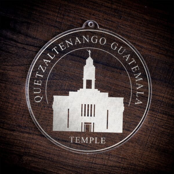 LDS Quetzaltenango Guatemala Temple Christmas Ornament laying on a Wooden Background