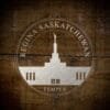 LDS Regina Saskatchewan Temple Christmas Ornament laying on a Wooden Background