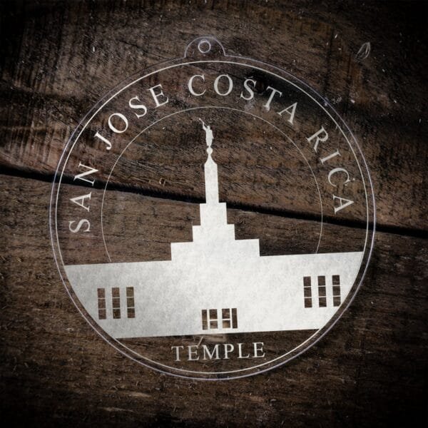 LDS San Jose Costa Rica Temple Christmas Ornament laying on a Wooden Background