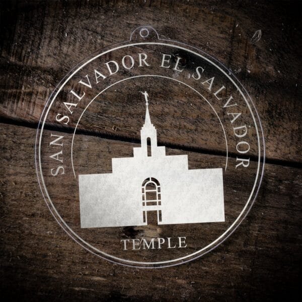 LDS San Salvador El Salvador Temple Christmas Ornament laying on a Wooden Background
