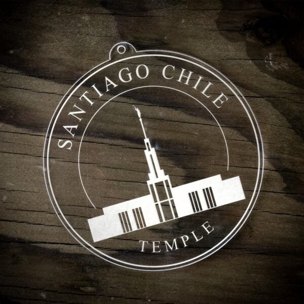 LDS Santiago Chile Temple Christmas Ornament laying on a Wooden Background