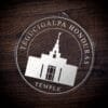 LDS Tegucigalpa Honduras Temple Christmas Ornament laying on a Wooden Background