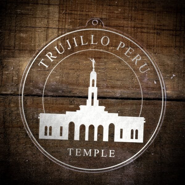 LDS Trujillo Peru Temple Christmas Ornament laying on a Wooden Background